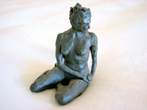 img: woman sitting